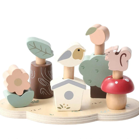 Wooden toy set with animals, plants, and a house on a white background