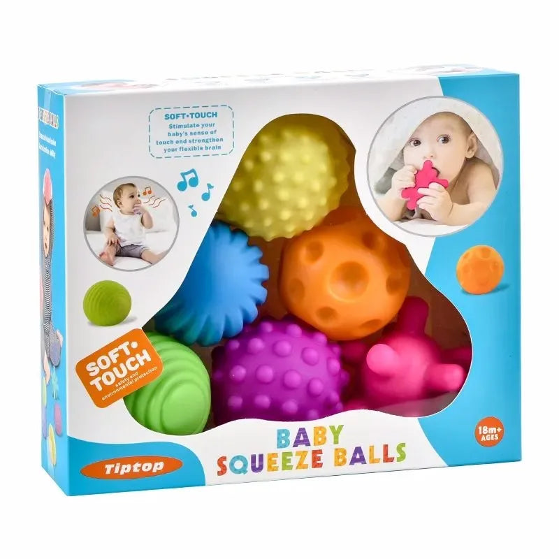 Box of Tiptop baby squeeze balls with colorful balls and a baby playing with a toy on the packaging.