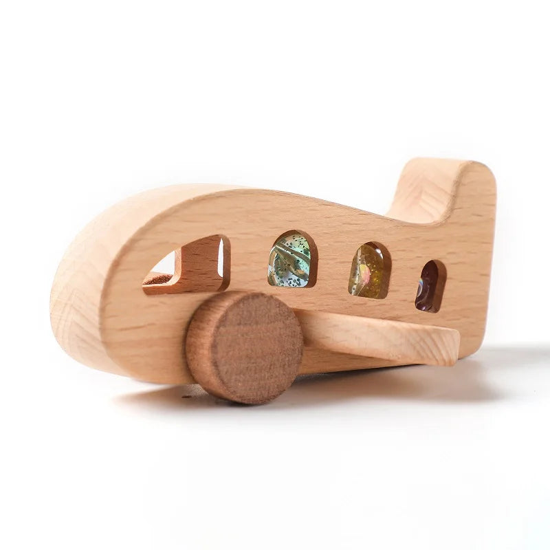 Wooden toy airplane on a white background