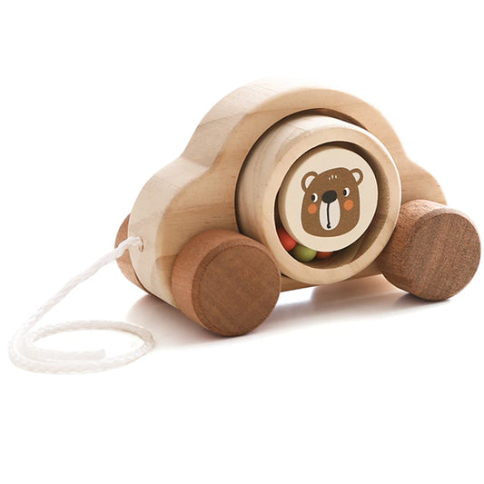 Wooden toy car with a bear face on a white background