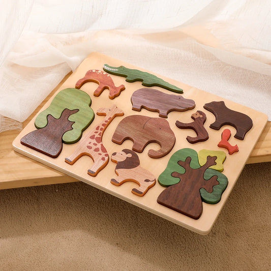 Wooden puzzle with animal and tree shapes on a wooden board.